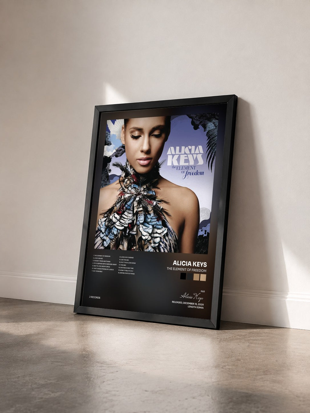 #noir Tableau de l'album The Element Of Freedom de Alicia Keys vu de trois quarts, cadre noir