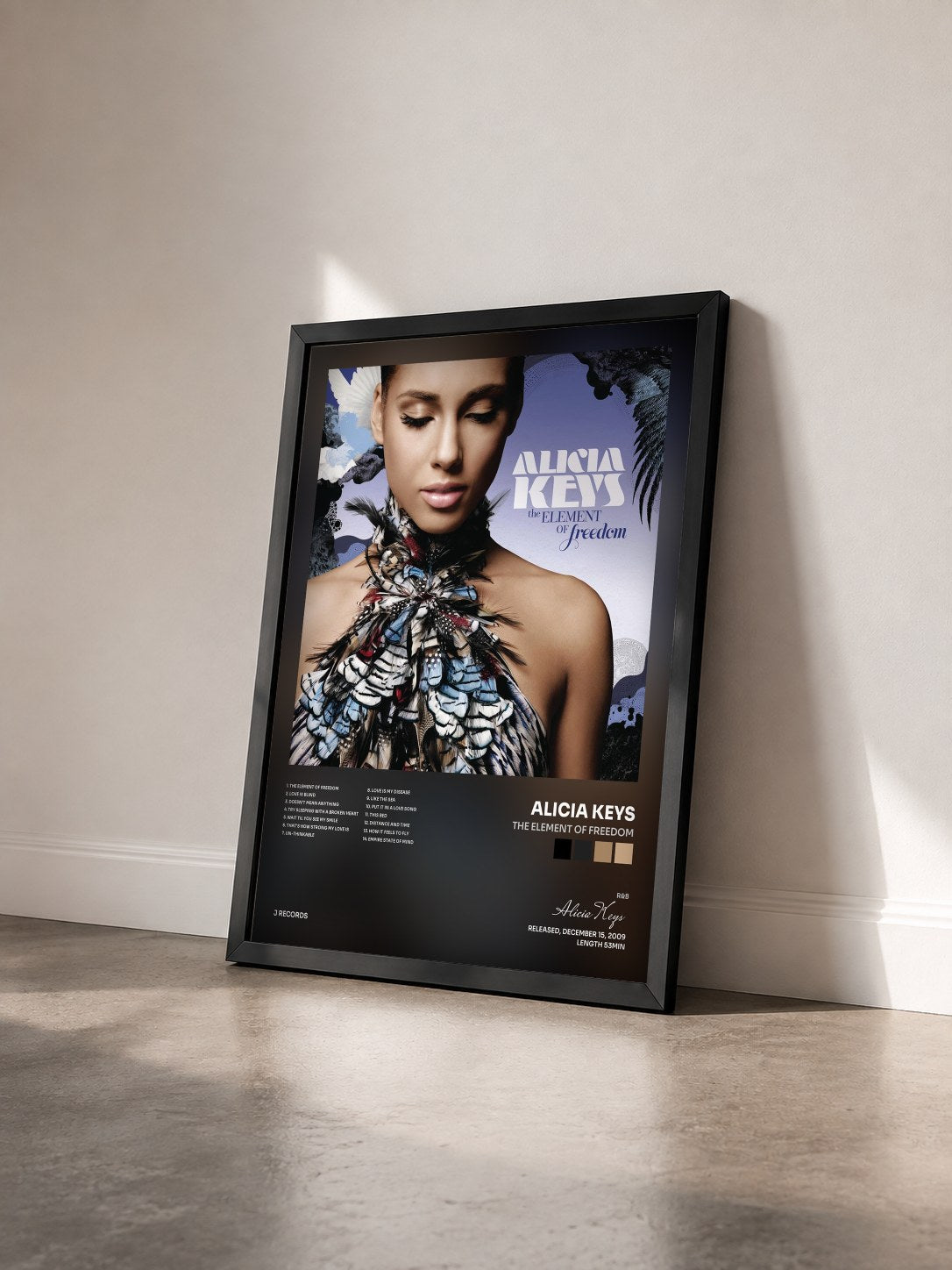 #noir Tableau de l'album The Element Of Freedom de Alicia Keys vu de trois quarts, cadre noir