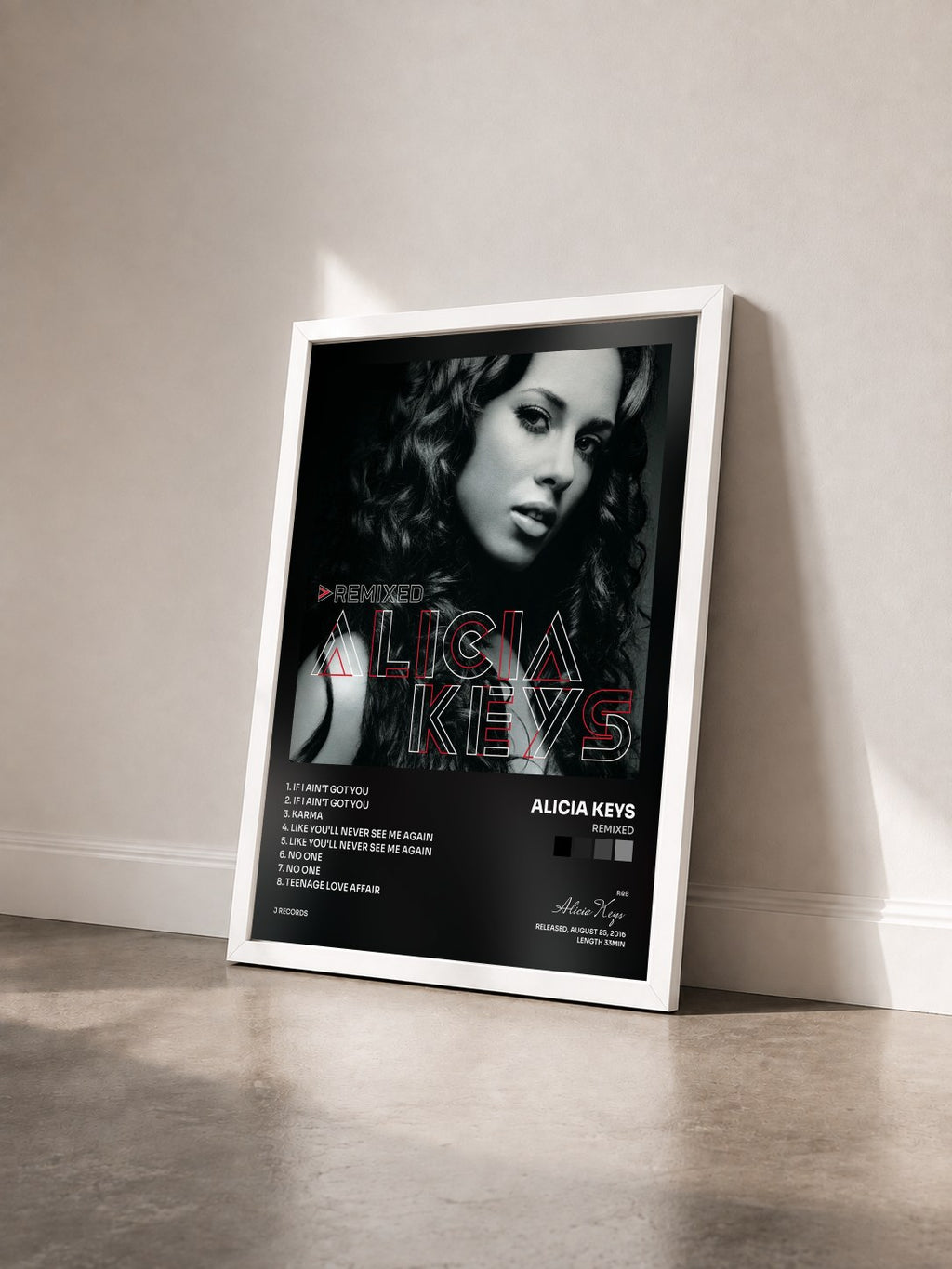#blanc Tableau de l'album Remixed de Alicia Keys vu de trois quarts, cadre blanc