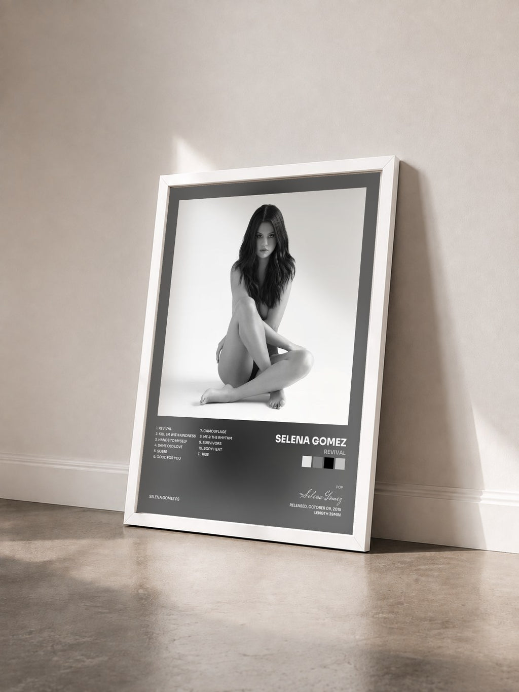 #blanc Tableau de l'album Revival de Selena Gomez vu de trois quarts, cadre blanc