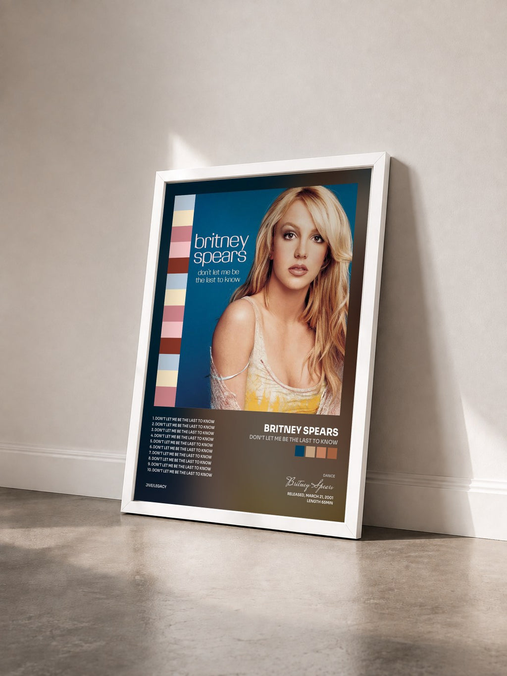 #blanc Tableau de l'album Don't Let Me Be The Last To Know de Britney Spears vu de trois quarts, cadre blanc