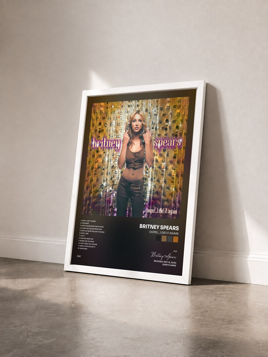 #blanc Oops!... I Did It Again by Britney Spears as a framed art print seen at an angle, white frame