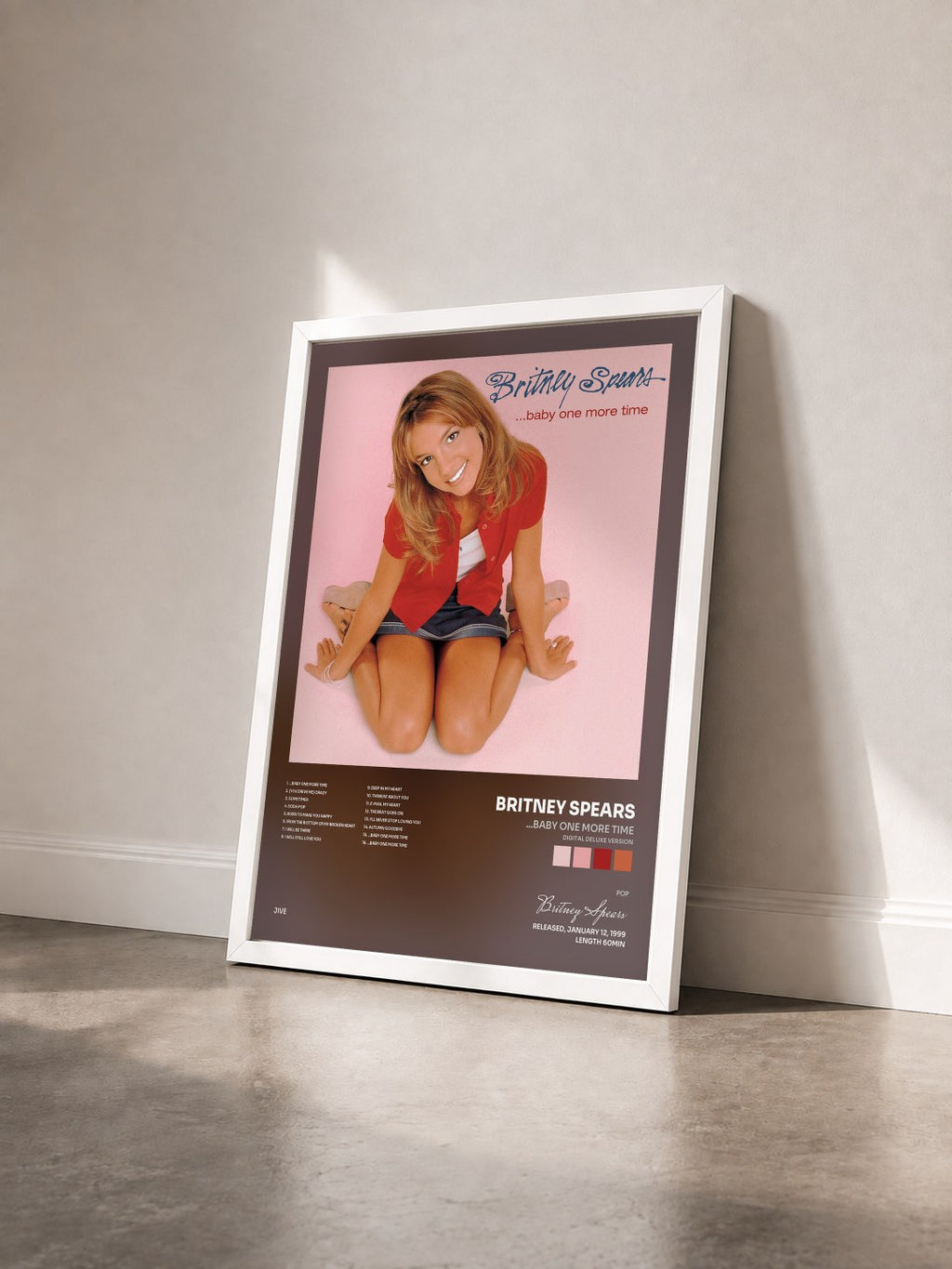 #blanc ...Baby One More Time (Digital Deluxe Version) von Britney Spears als gerahmter Kunstdruck von schräg gesehen, weißer Rahmen