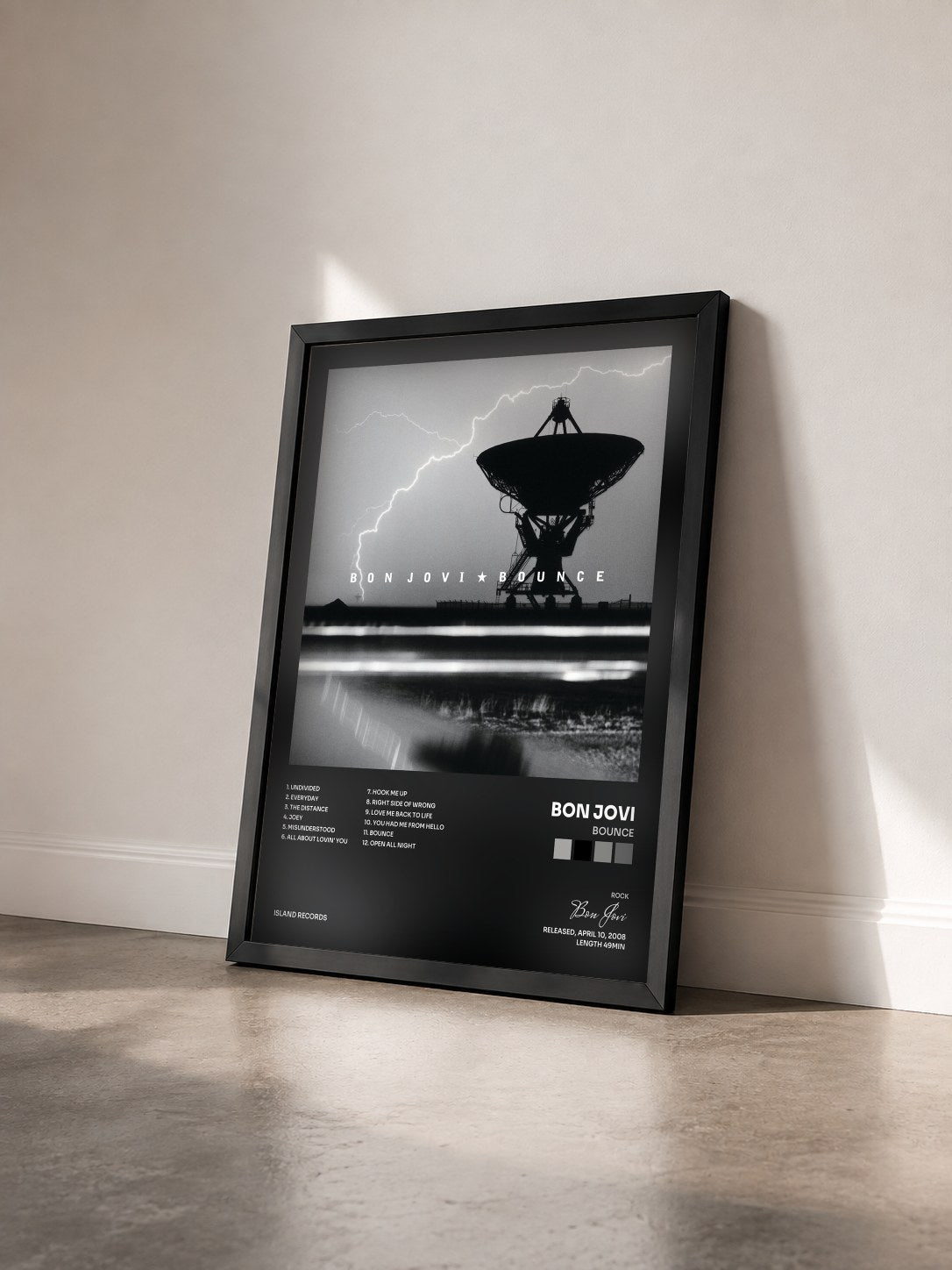 #noir Bounce by Bon Jovi as a framed art print seen at an angle, black frame