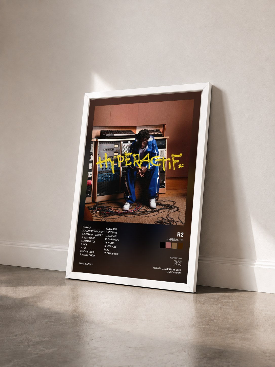 #blanc HYPERACTIF by R2 as a framed art print seen at an angle, white frame