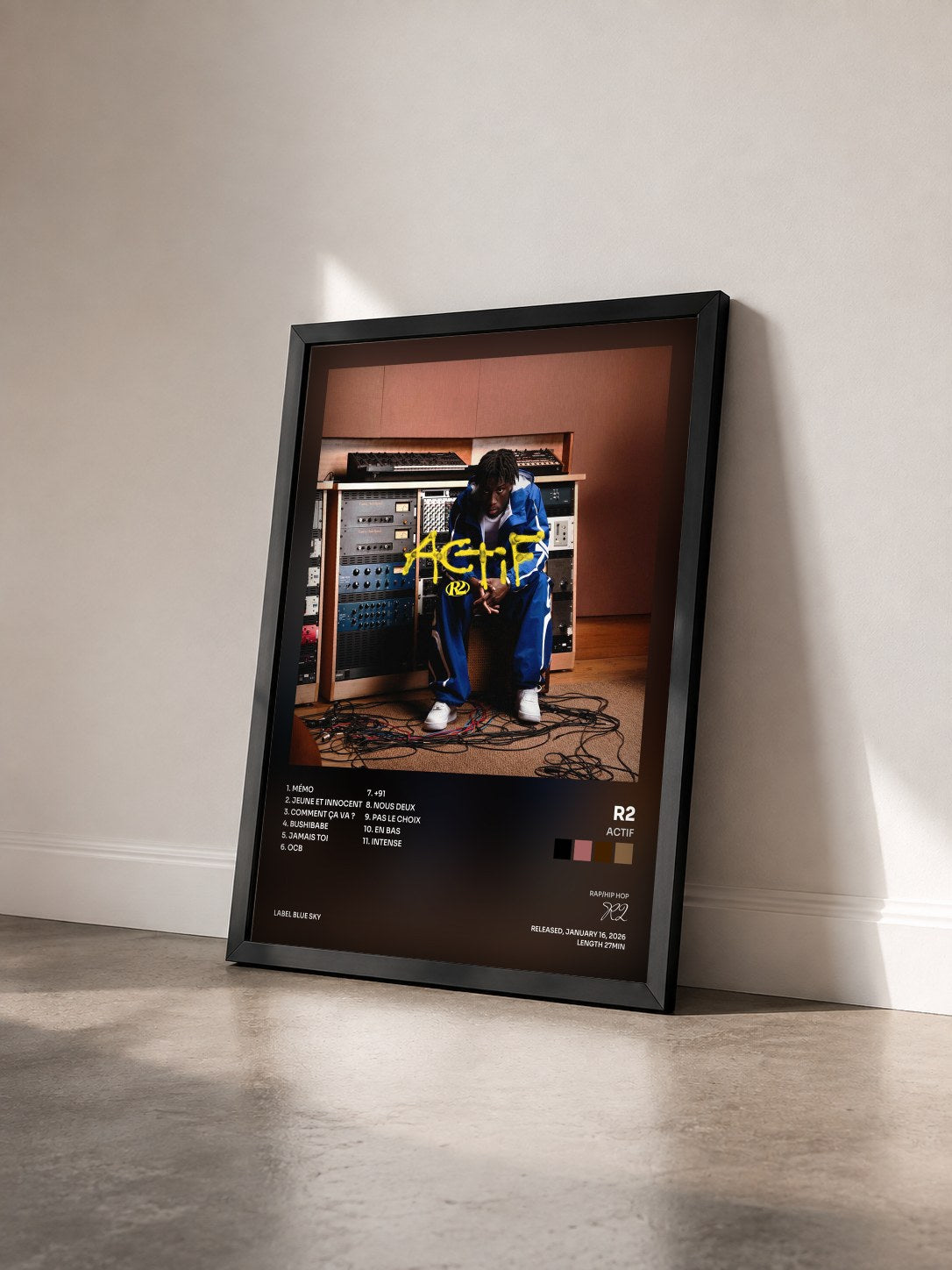 #noir ACTIF by R2 as a framed art print seen at an angle, black frame