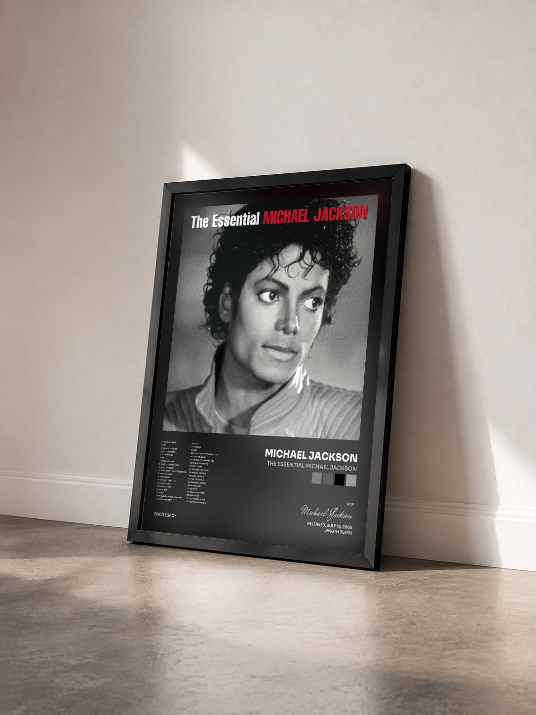 #noir Tableau de l'album The Essential Michael Jackson de Michael Jackson vu de trois quarts, cadre noir