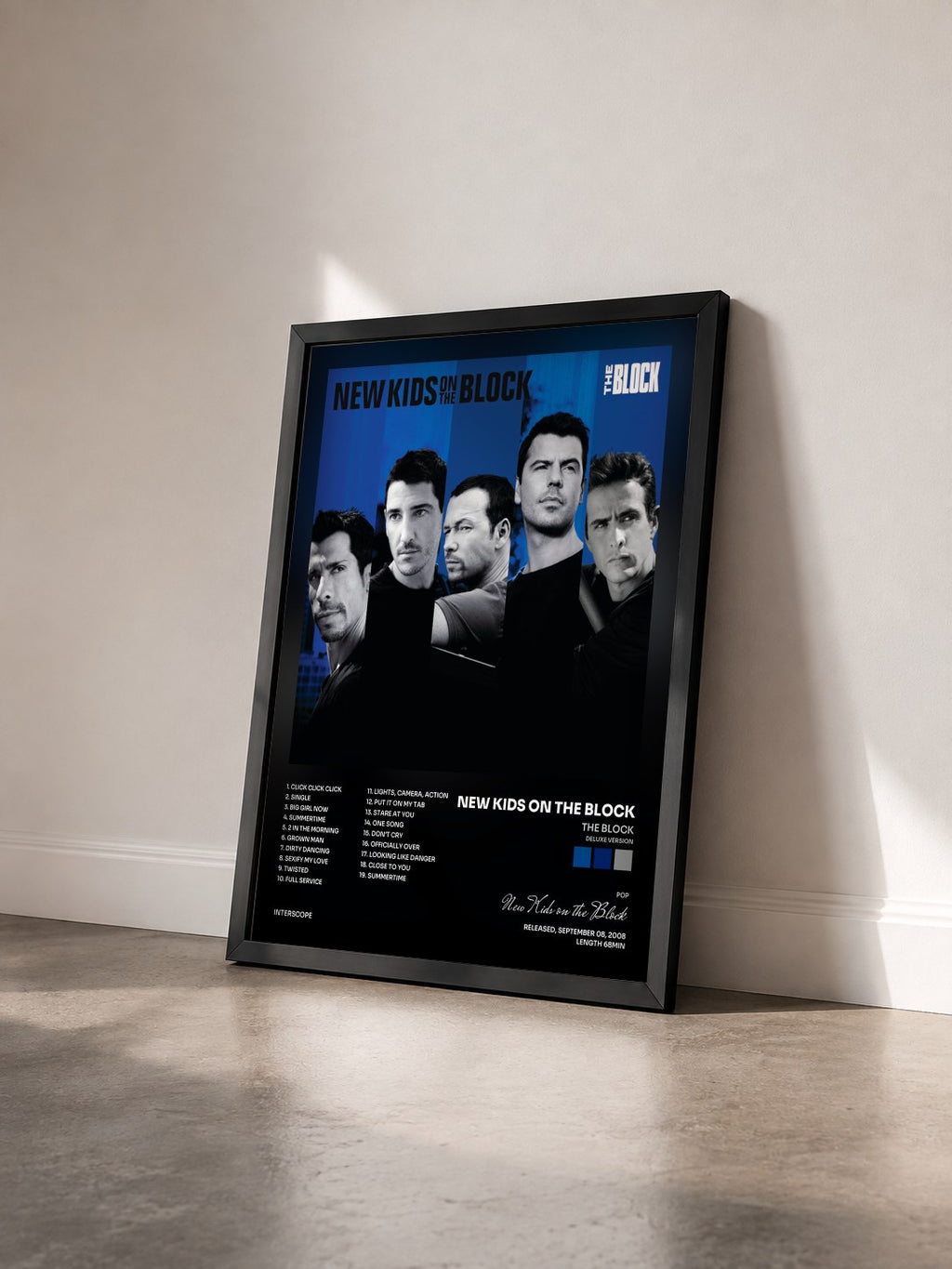 #noir Tableau de l'album The Block (Deluxe Version) de New Kids on the Block vu de trois quarts, cadre noir