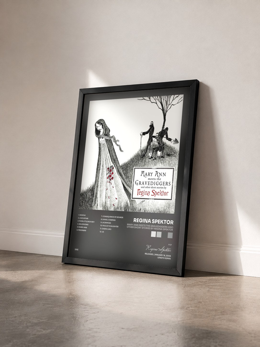 #noir Tableau de l'album Mary Ann Meets the Gravediggers and Other Short Stories by Regina Spektor de Regina Spektor vu de trois quarts, cadre noir