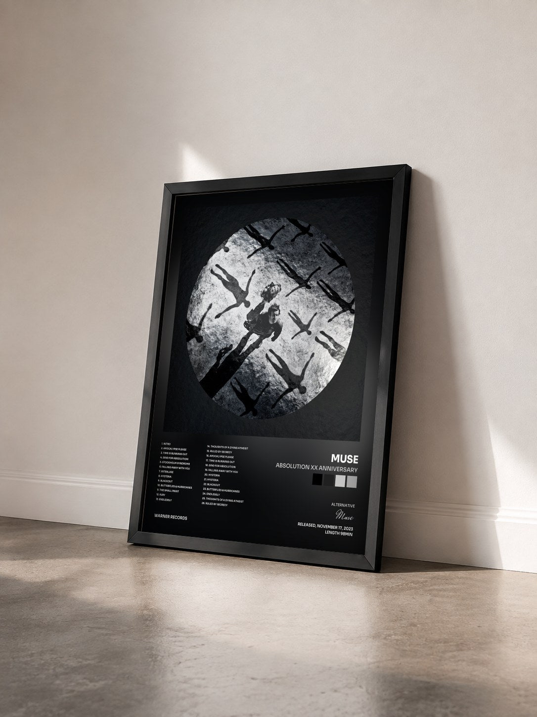 #noir Tableau de l'album Absolution XX Anniversary de Muse vu de trois quarts, cadre noir