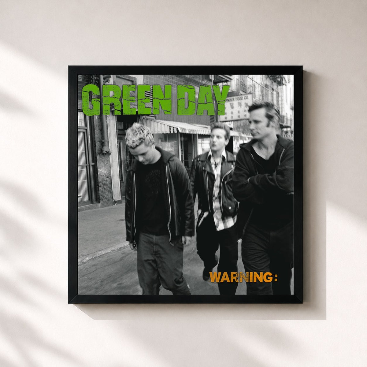 #noir Warning de Green Day en lámina cuadrada enmarcada, marco negro de 32x32 cm