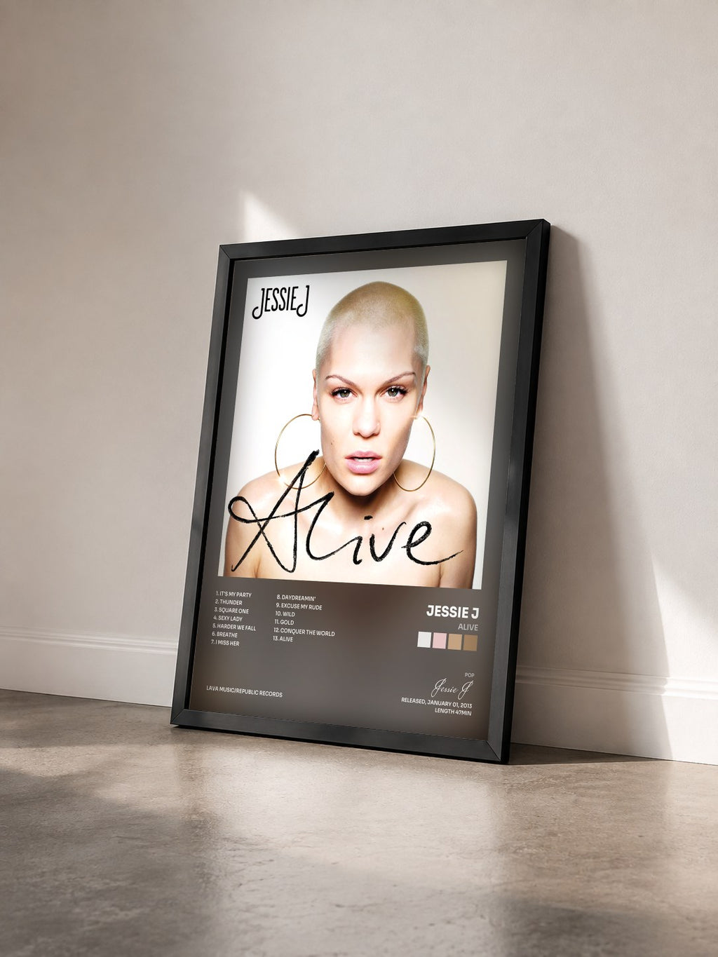 #noir Alive by Jessie J as a framed art print seen at an angle, black frame