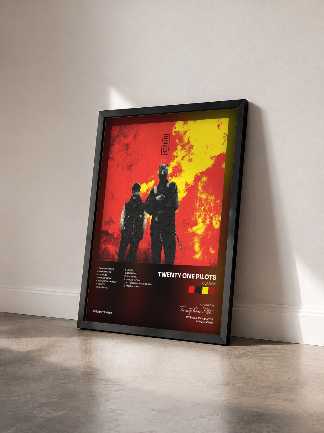 #noir Tableau de l'album Clancy de Twenty One Pilots vu de trois quarts, cadre noir