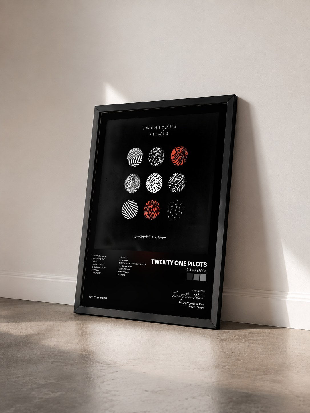 #noir Tableau de l'album Blurryface de Twenty One Pilots vu de trois quarts, cadre noir