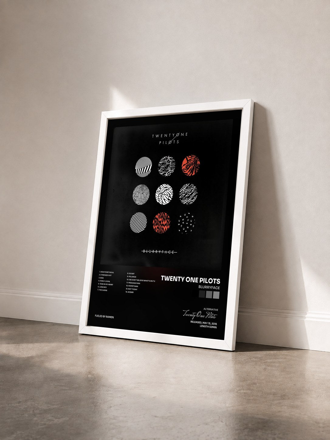 #blanc Tableau de l'album Blurryface de Twenty One Pilots vu de trois quarts, cadre blanc