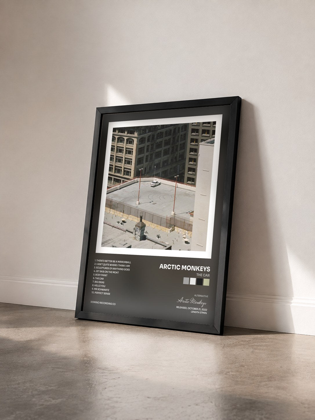 #noir The Car by Arctic Monkeys as a framed art print seen at an angle, black frame