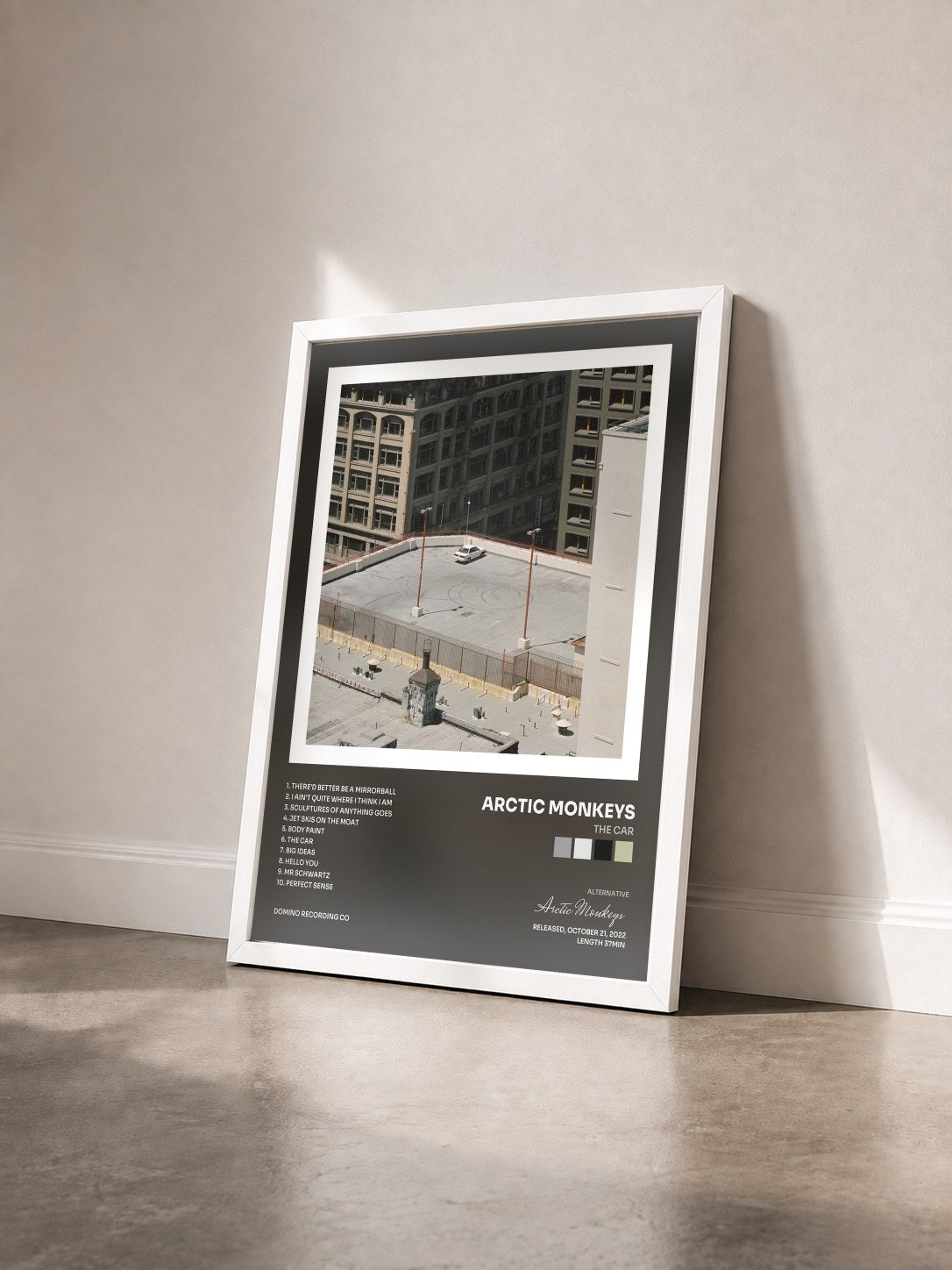#blanc The Car by Arctic Monkeys as a framed art print seen at an angle, white frame