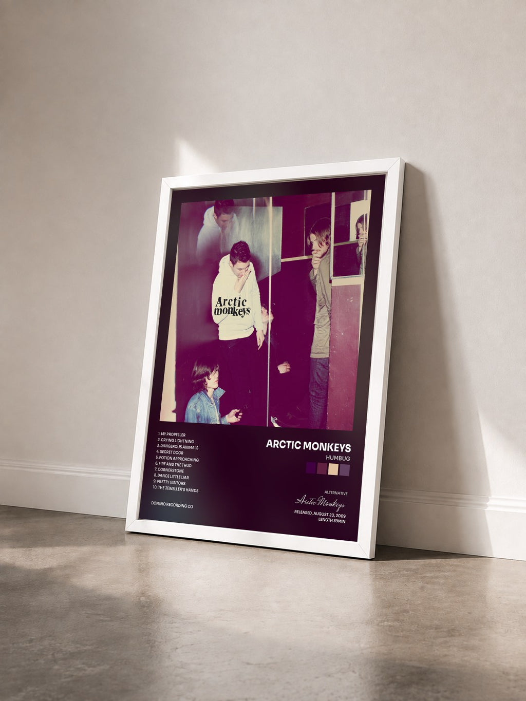 #blanc Tableau de l'album Humbug de Arctic Monkeys vu de trois quarts, cadre blanc