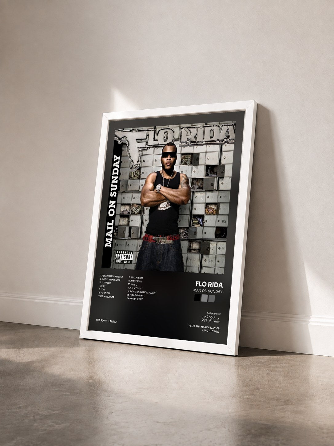 #blanc Tableau de l'album Mail on Sunday de Flo Rida vu de trois quarts, cadre blanc