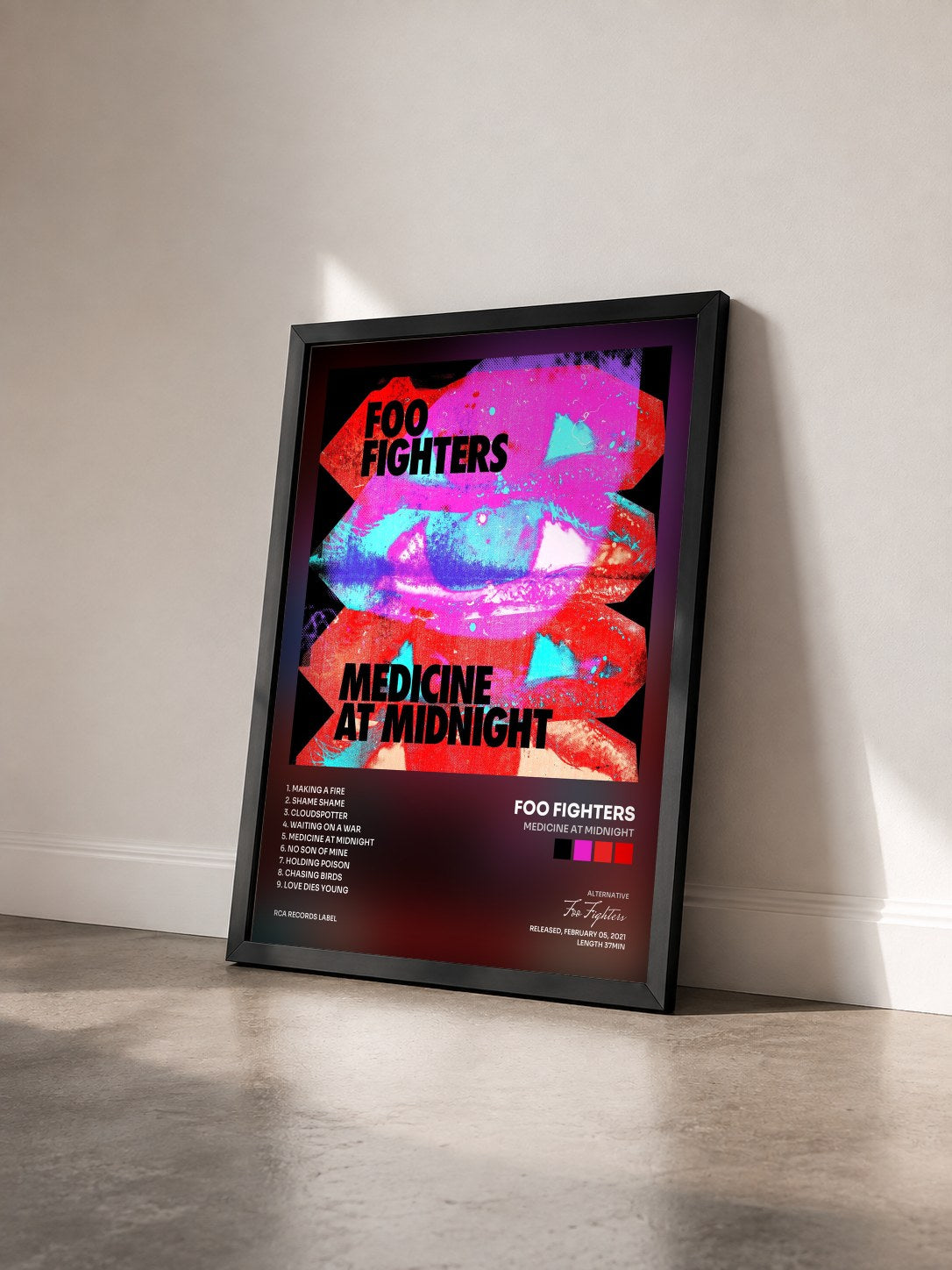 #noir Tableau de l'album Medicine At Midnight de Foo Fighters vu de trois quarts, cadre noir