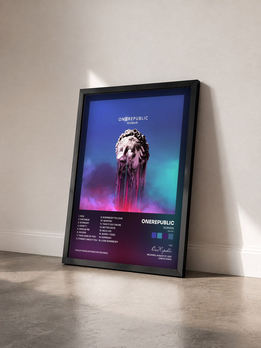 #noir Tableau de l'album Human (Deluxe) de OneRepublic vu de trois quarts, cadre noir