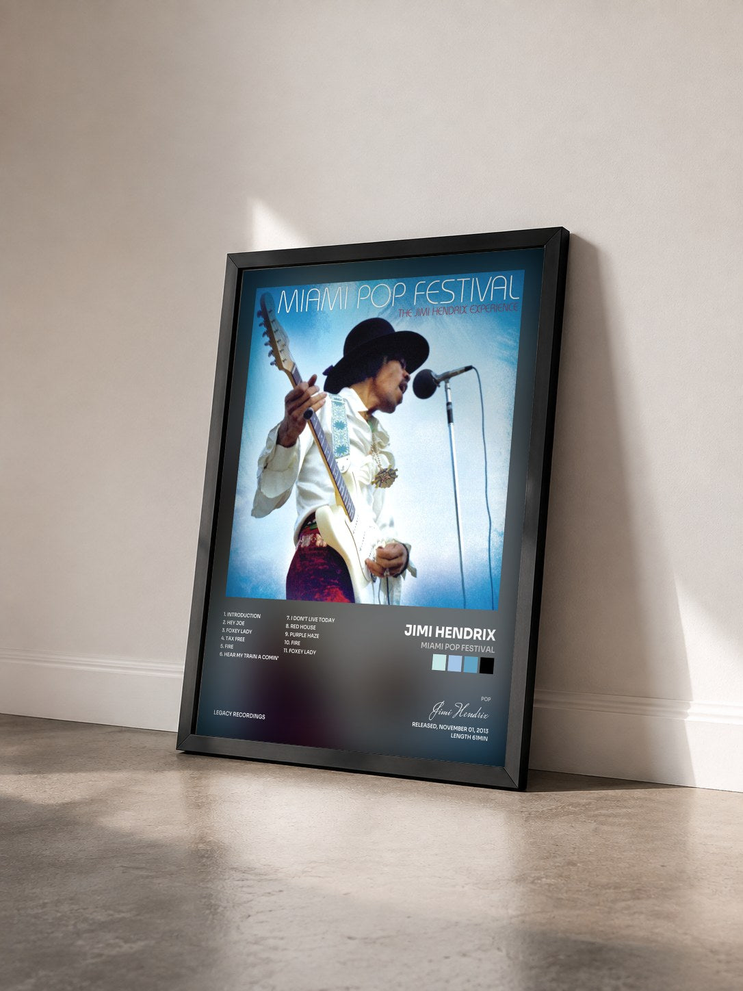 #noir Tableau de l'album Miami Pop Festival de Jimi Hendrix vu de trois quarts, cadre noir