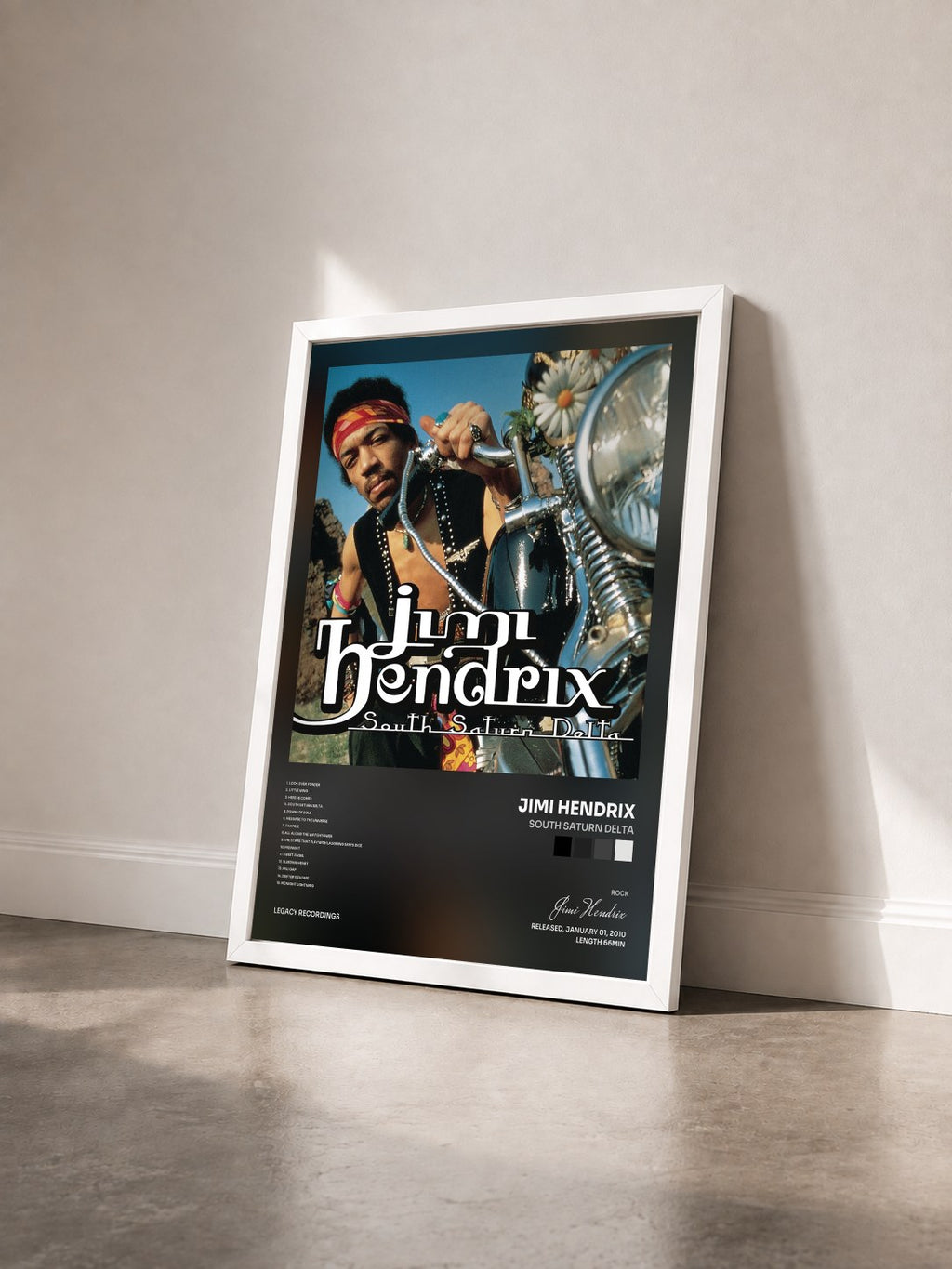 #blanc Tableau de l'album South Saturn Delta de Jimi Hendrix vu de trois quarts, cadre blanc
