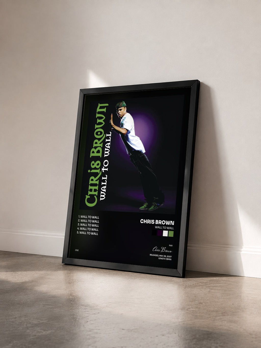#noir Tableau de l'album Wall To Wall de Chris Brown vu de trois quarts, cadre noir