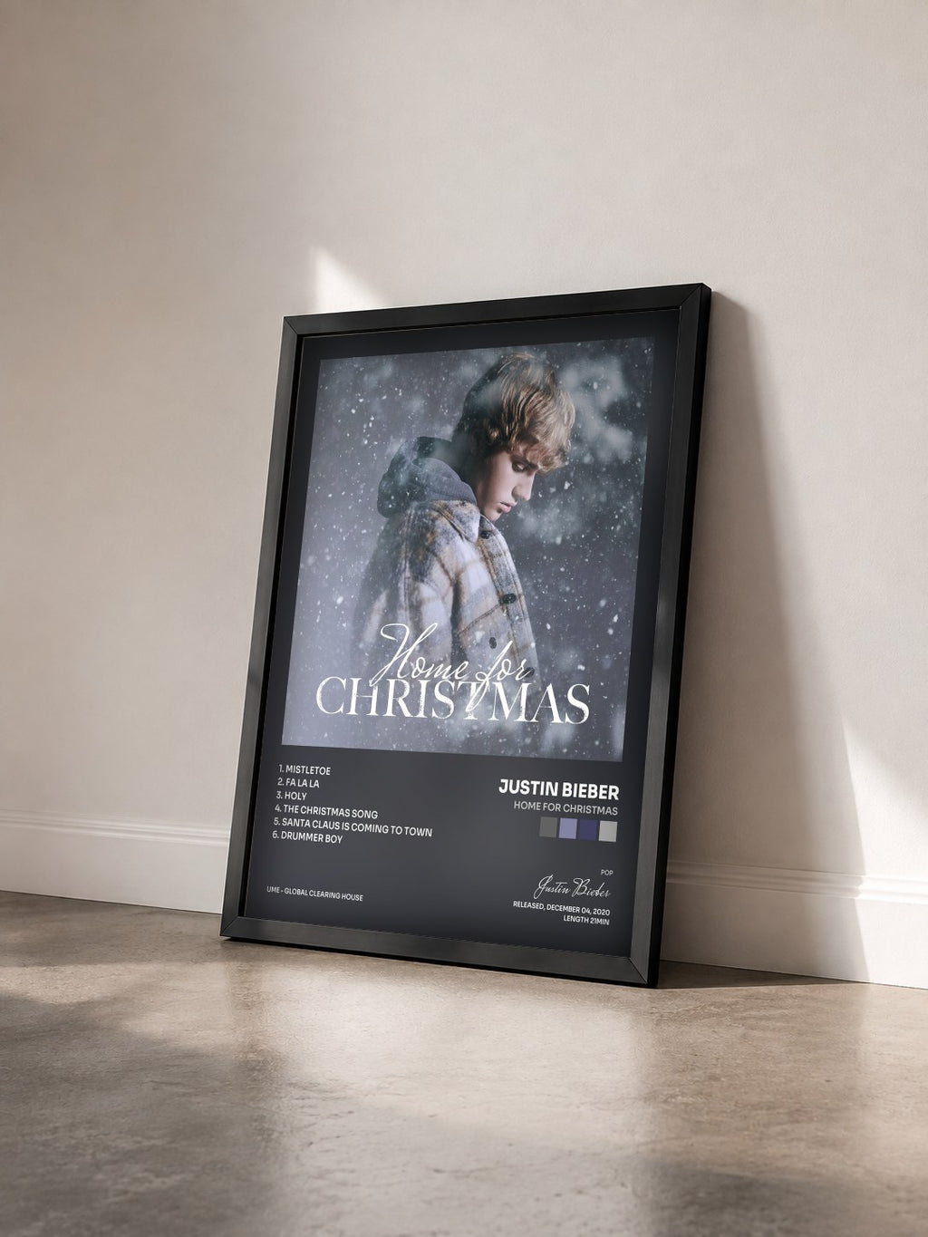 #noir Tableau de l'album Home for Christmas de Justin Bieber vu de trois quarts, cadre noir