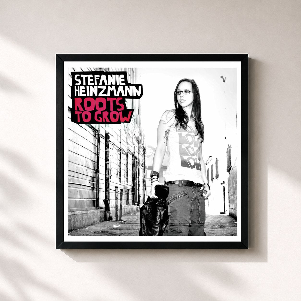 #noir Tableau carré de l'album Roots To Grow de Stefanie Heinzmann, cadre noir 32x32 cm