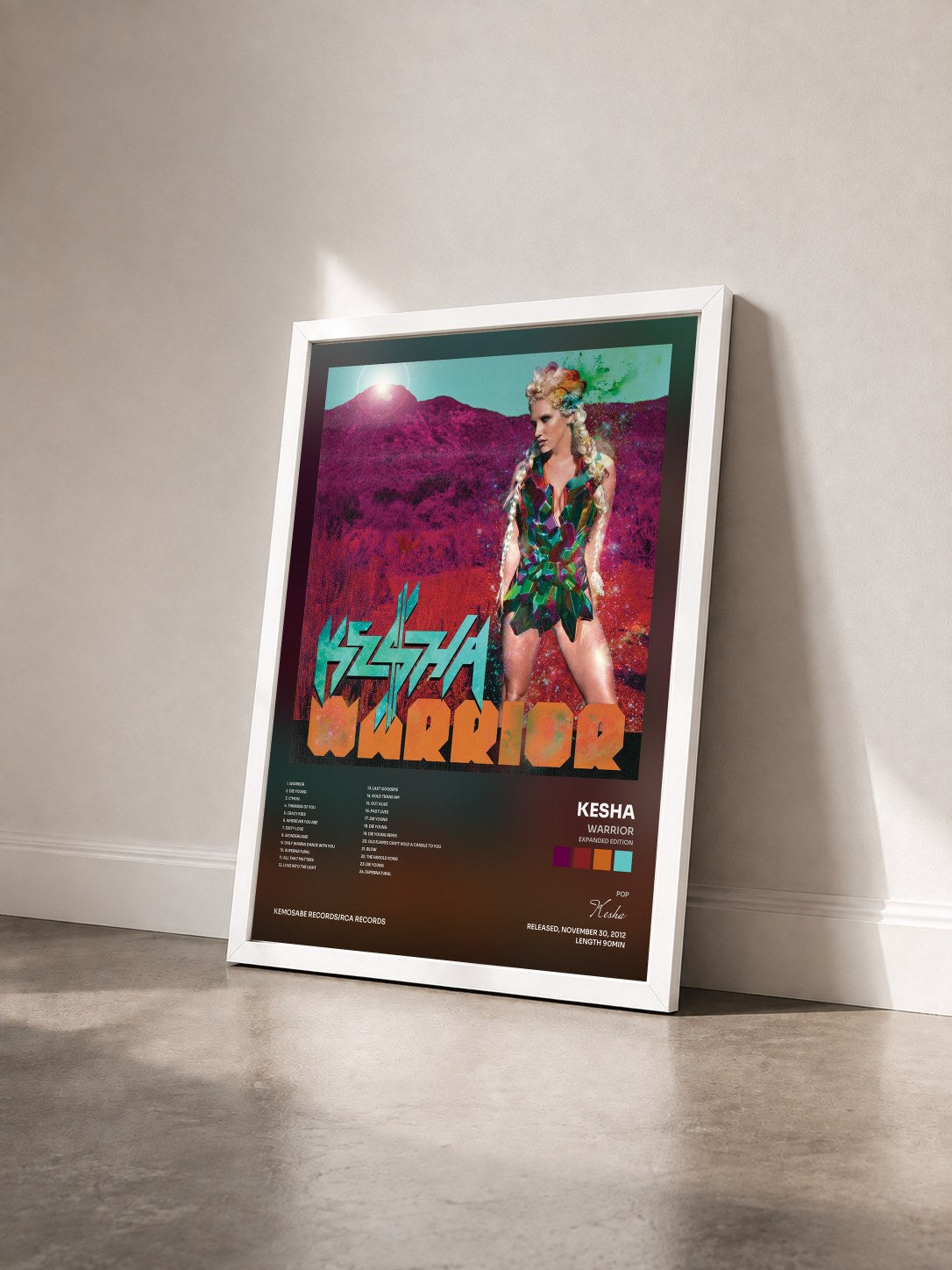 #blanc Tableau de l'album Warrior (Expanded Edition) de Kesha vu de trois quarts, cadre blanc