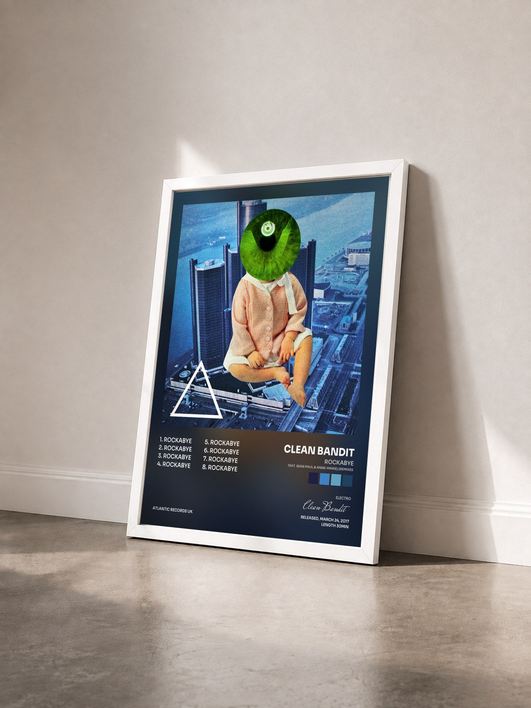 #blanc Tableau de l'album Rockabye (feat. Sean Paul & Anne-Marie) (Remixes) de Clean Bandit vu de trois quarts, cadre blanc