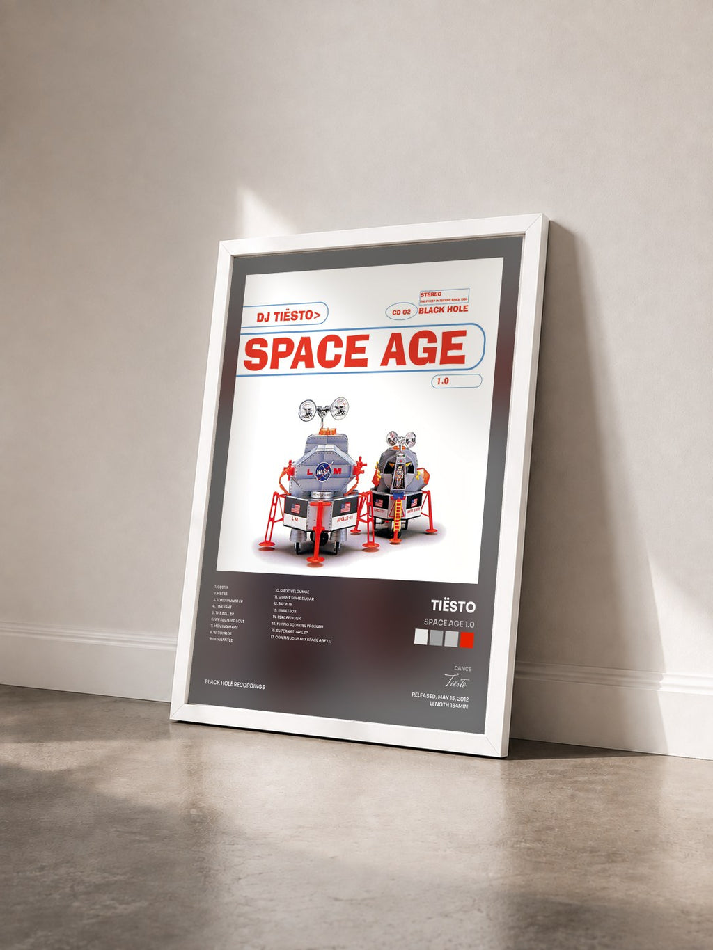 #blanc Tableau de l'album Space Age 1.0 de Tiësto vu de trois quarts, cadre blanc