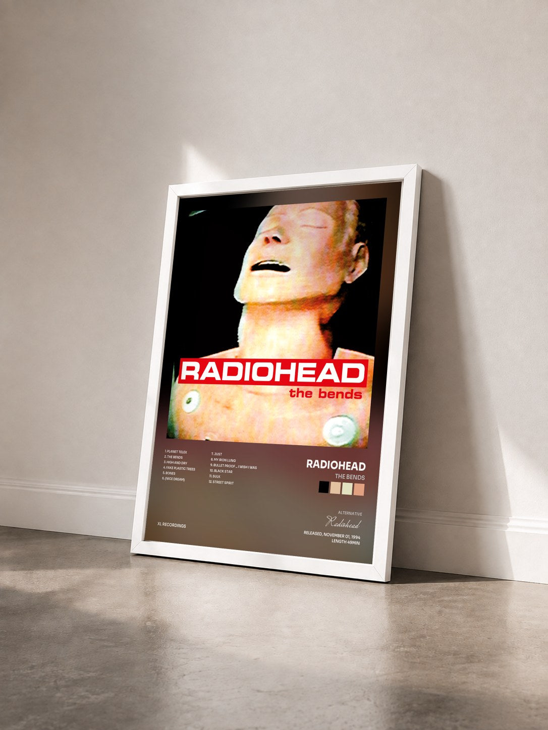 #blanc Tableau de l'album The Bends de Radiohead vu de trois quarts, cadre blanc