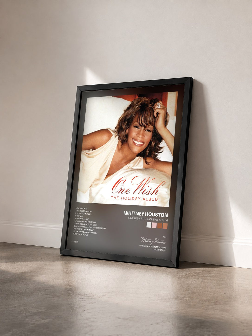 #noir Tableau de l'album One Wish / The Holiday Album de Whitney Houston vu de trois quarts, cadre noir