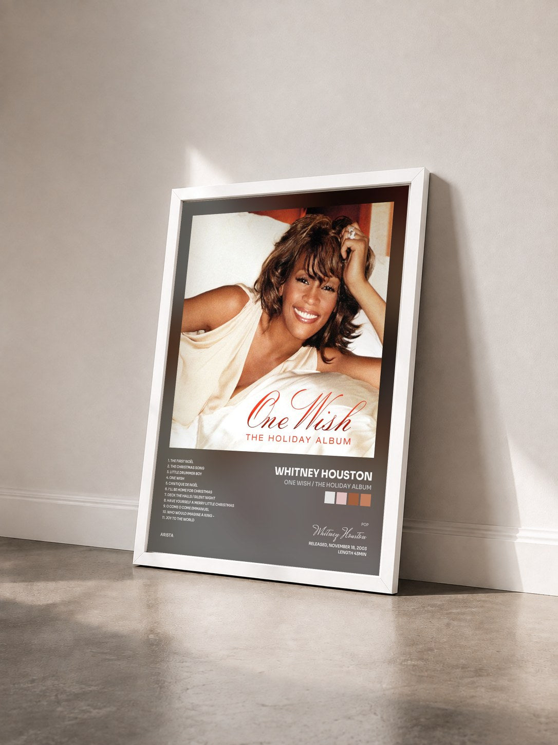 #blanc Tableau de l'album One Wish / The Holiday Album de Whitney Houston vu de trois quarts, cadre blanc