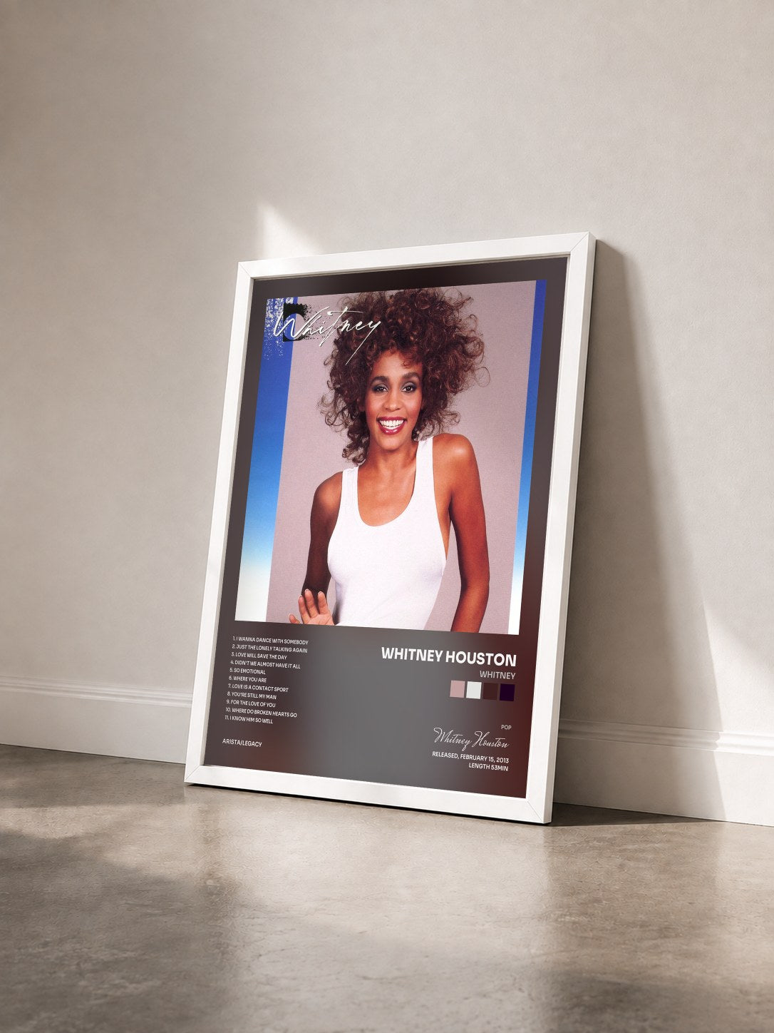 #blanc Tableau de l'album Whitney de Whitney Houston vu de trois quarts, cadre blanc