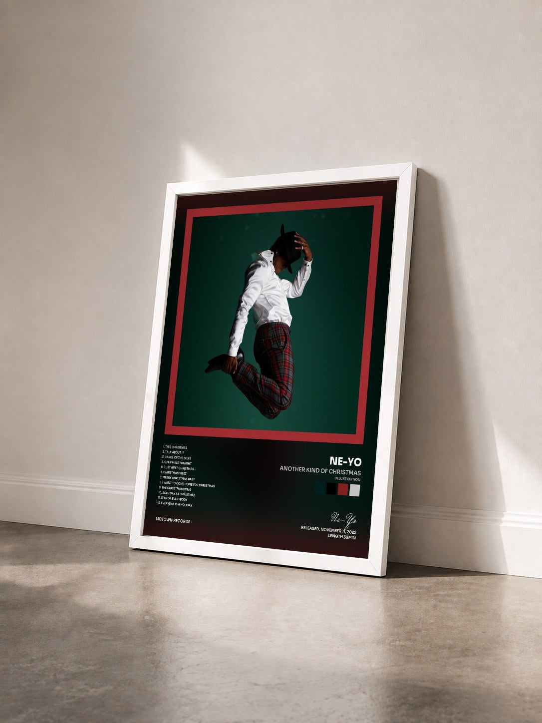 #blanc Tableau de l'album Another Kind Of Christmas (Deluxe Edition) de Ne-Yo vu de trois quarts, cadre blanc