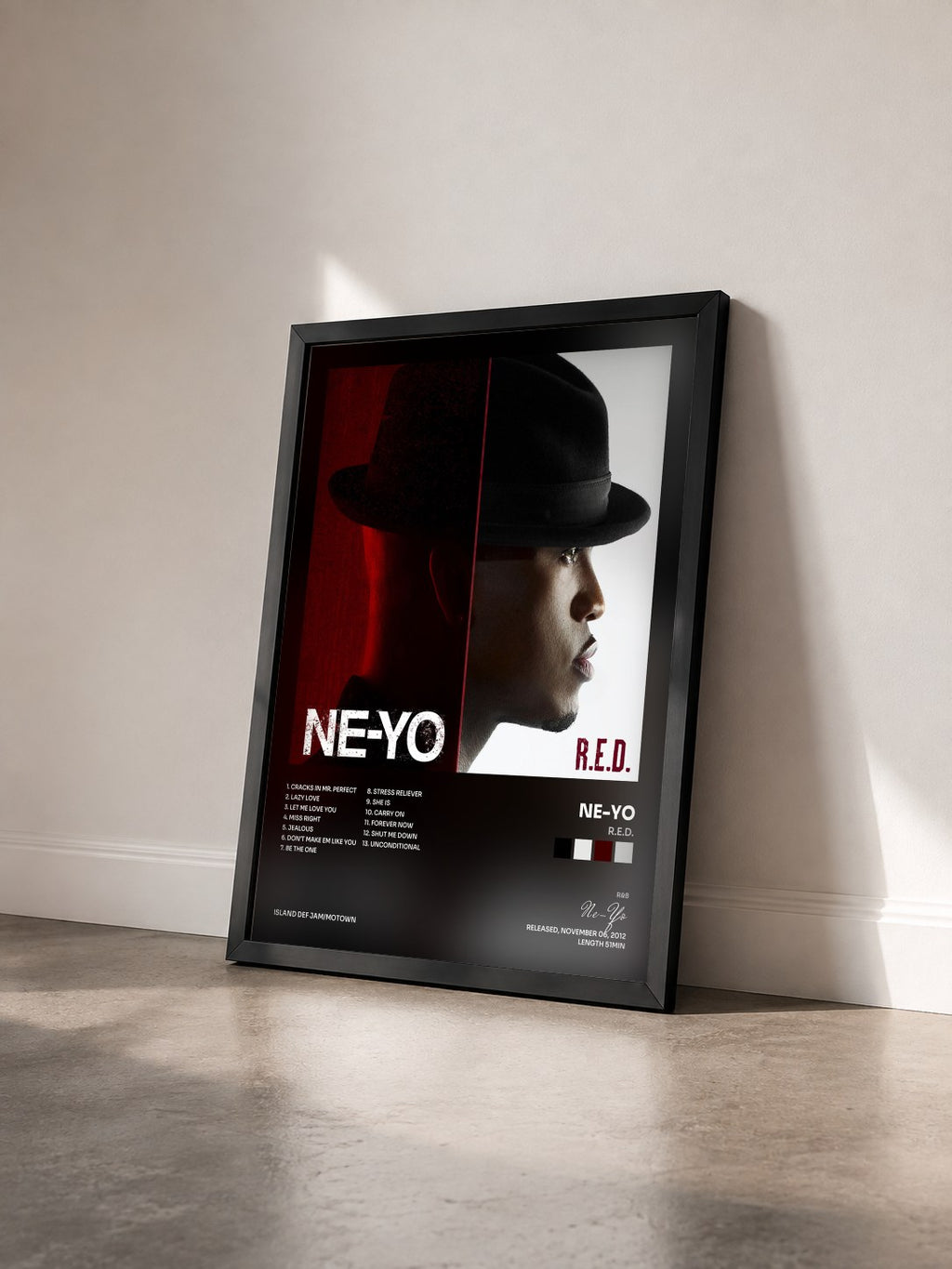 #noir Tableau de l'album R.E.D. de Ne-Yo vu de trois quarts, cadre noir