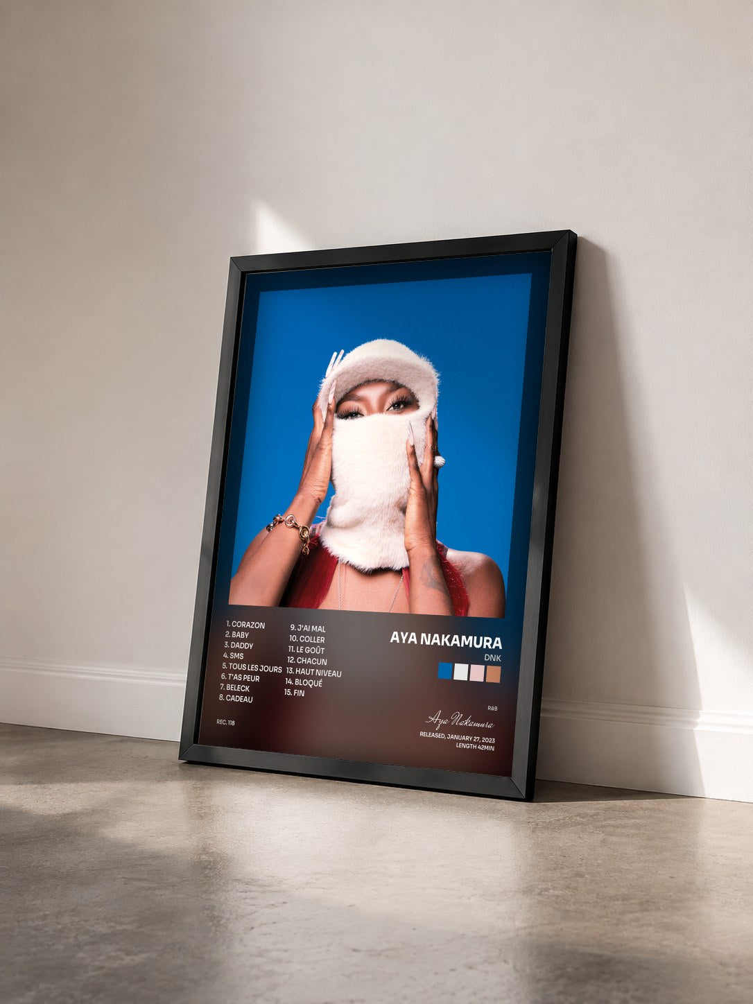 #noir DNK by Aya Nakamura as a framed art print seen at an angle, black frame