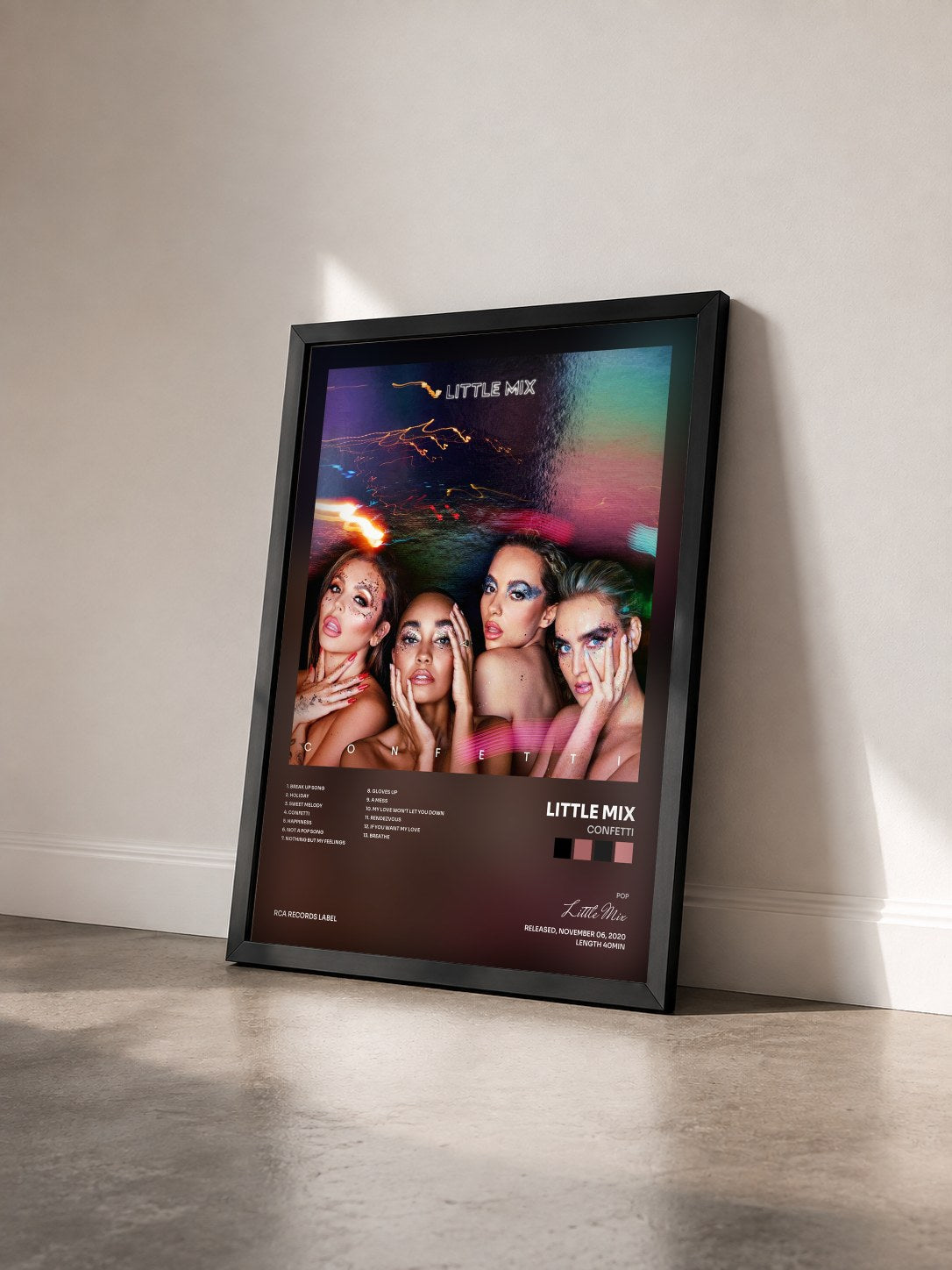 #noir Tableau de l'album Confetti de Little Mix vu de trois quarts, cadre noir