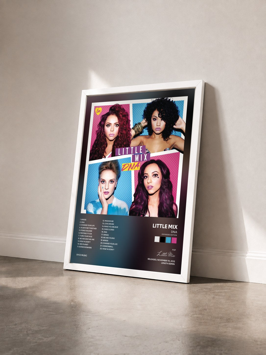 #blanc Tableau de l'album DNA (Expanded Edition) de Little Mix vu de trois quarts, cadre blanc