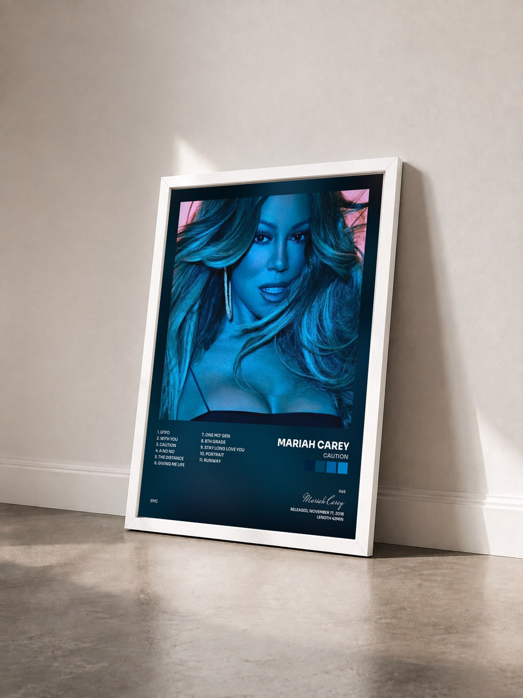 #blanc Tableau de l'album Caution de Mariah Carey vu de trois quarts, cadre blanc