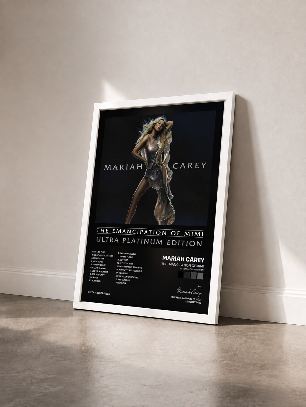 #blanc Tableau de l'album The Emancipation Of Mimi (Ultra Platinum Edition) de Mariah Carey vu de trois quarts, cadre blanc