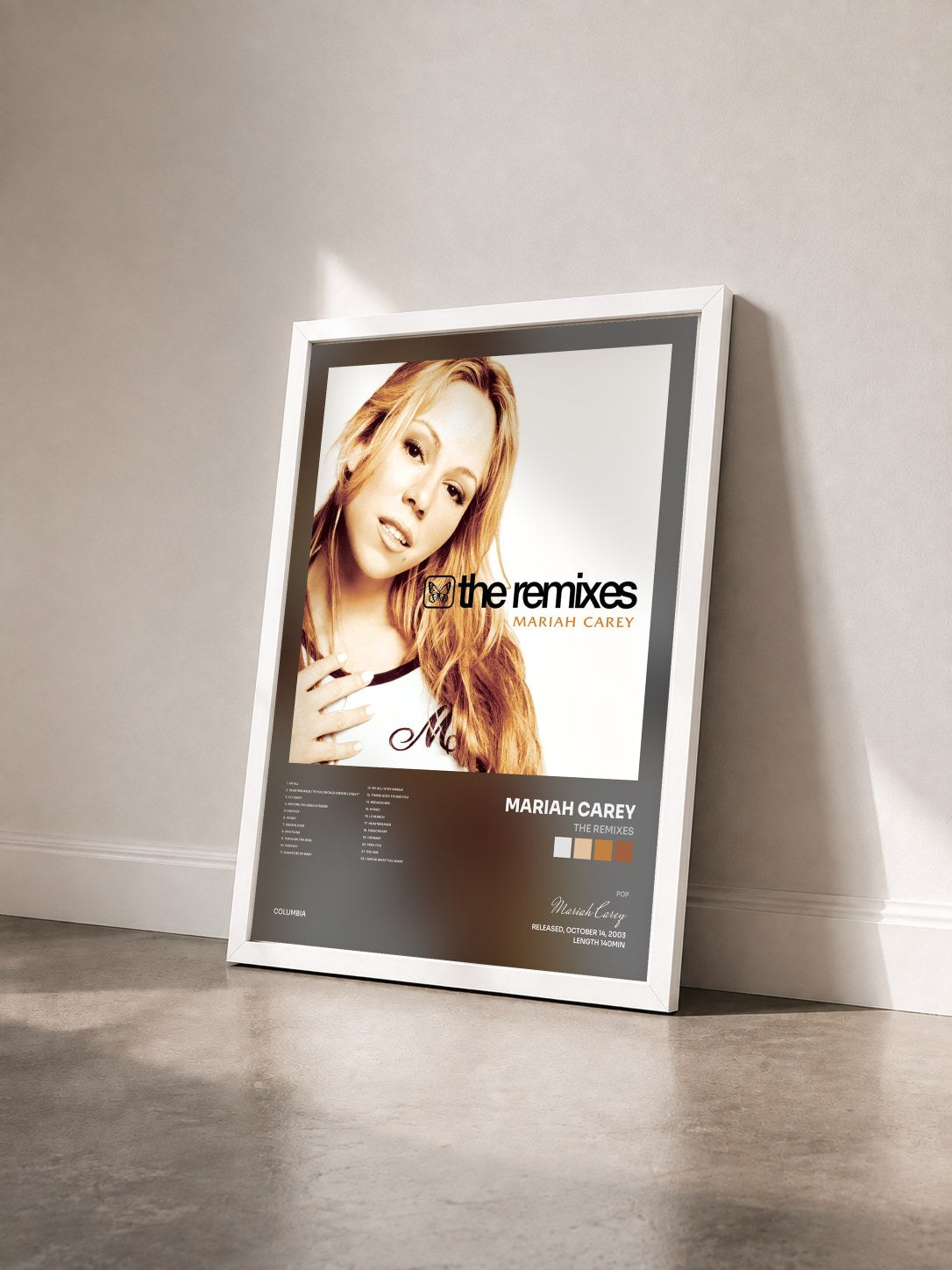 #blanc Tableau de l'album The Remixes de Mariah Carey vu de trois quarts, cadre blanc