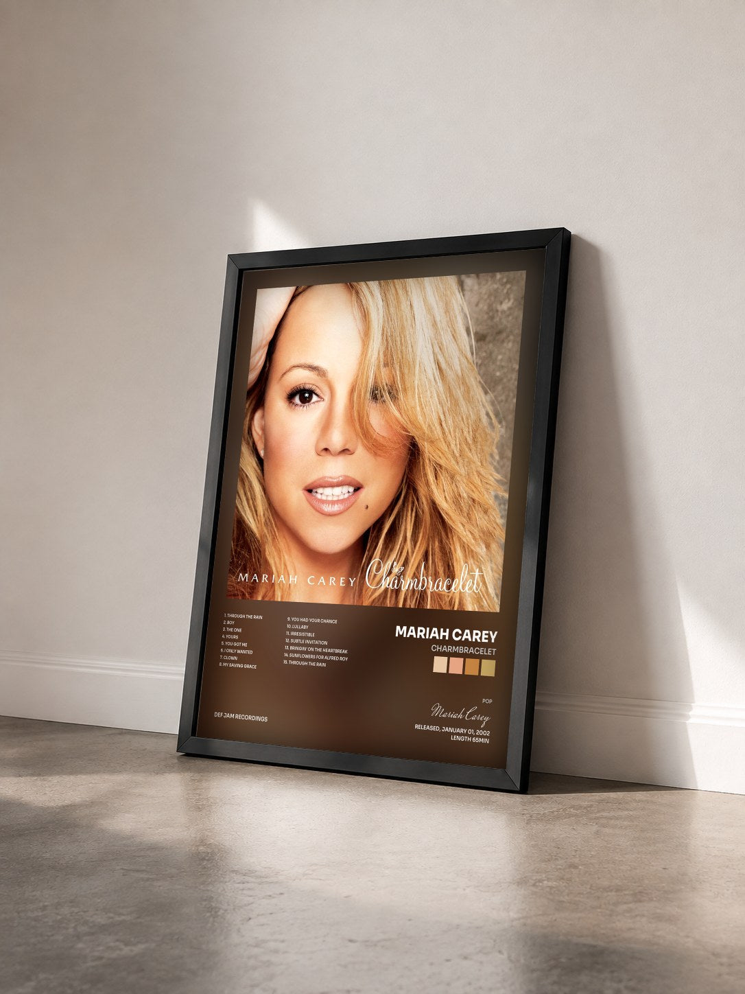#noir Tableau de l'album Charmbracelet de Mariah Carey vu de trois quarts, cadre noir