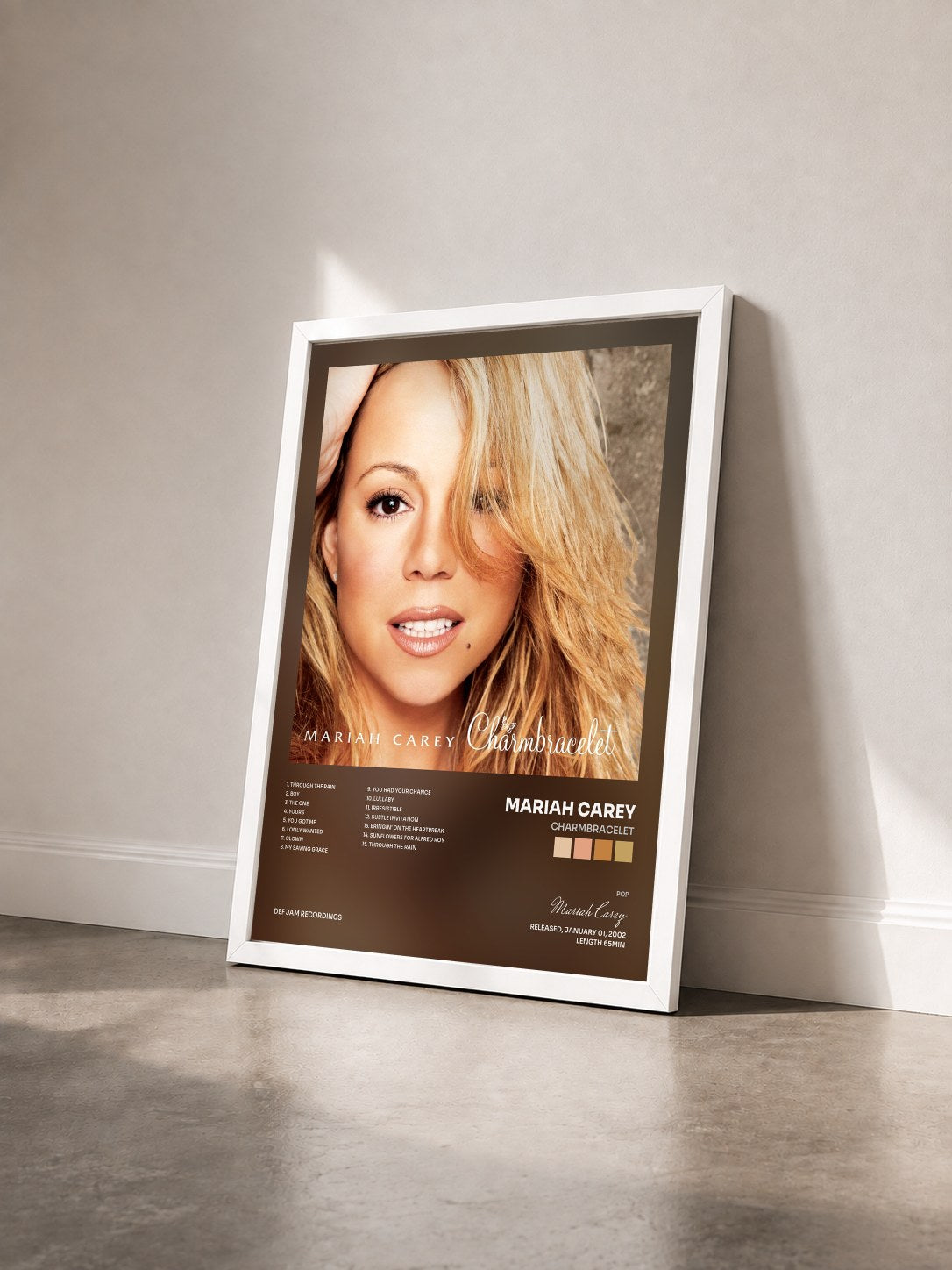 #blanc Tableau de l'album Charmbracelet de Mariah Carey vu de trois quarts, cadre blanc