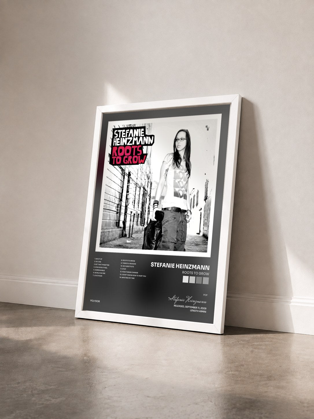 #blanc Tableau de l'album Roots To Grow de Stefanie Heinzmann vu de trois quarts, cadre blanc