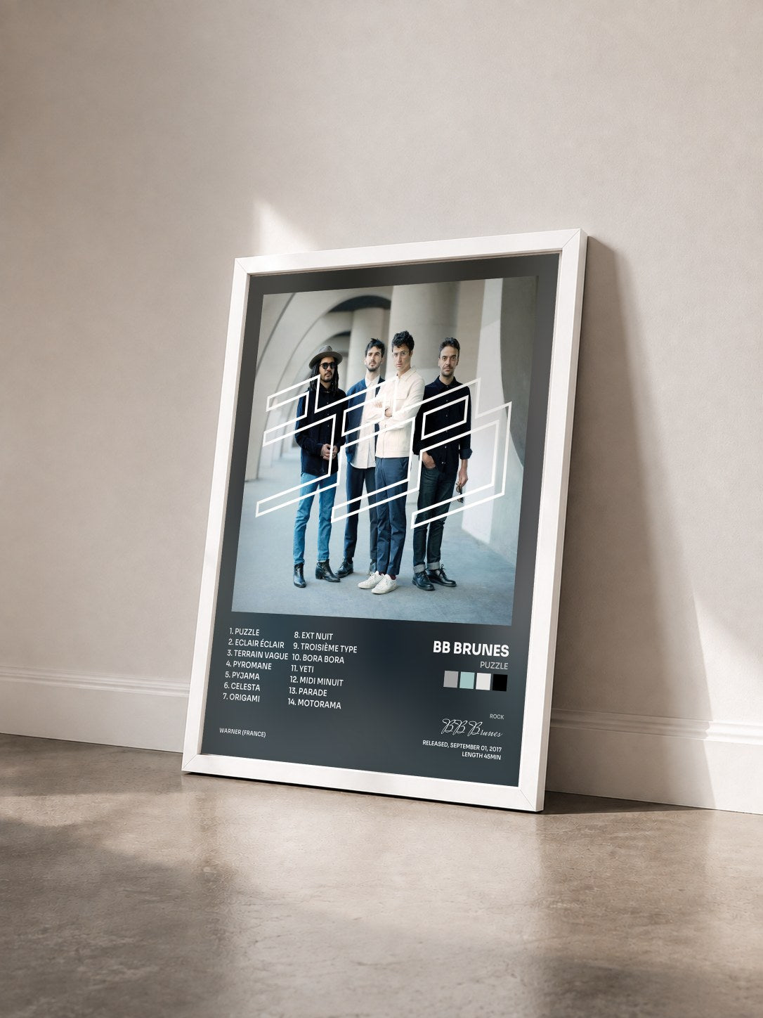 #blanc Tableau de l'album Puzzle de BB Brunes vu de trois quarts, cadre blanc