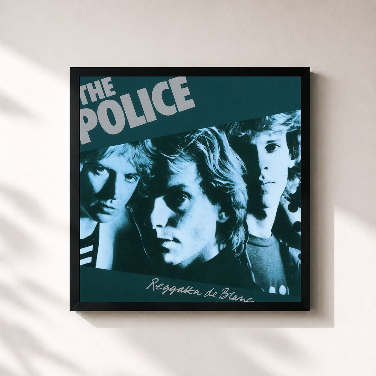 #noir Reggatta De Blanc (Remastered 2003) von The Police als quadratischer Kunstdruck, schwarzer Rahmen 32x32 cm